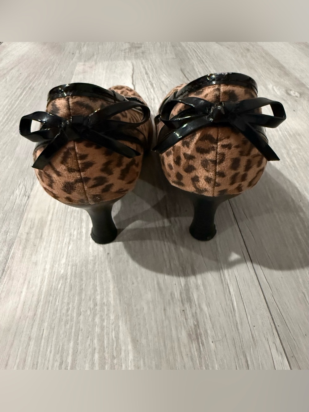 Jellypop Leopard Print Heels with Black Patent Bow